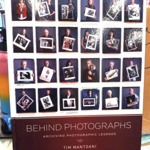 Behind Photographs front cover