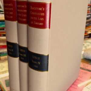 Blackstone's Commentaries spines of all three volumes and front board of one volume