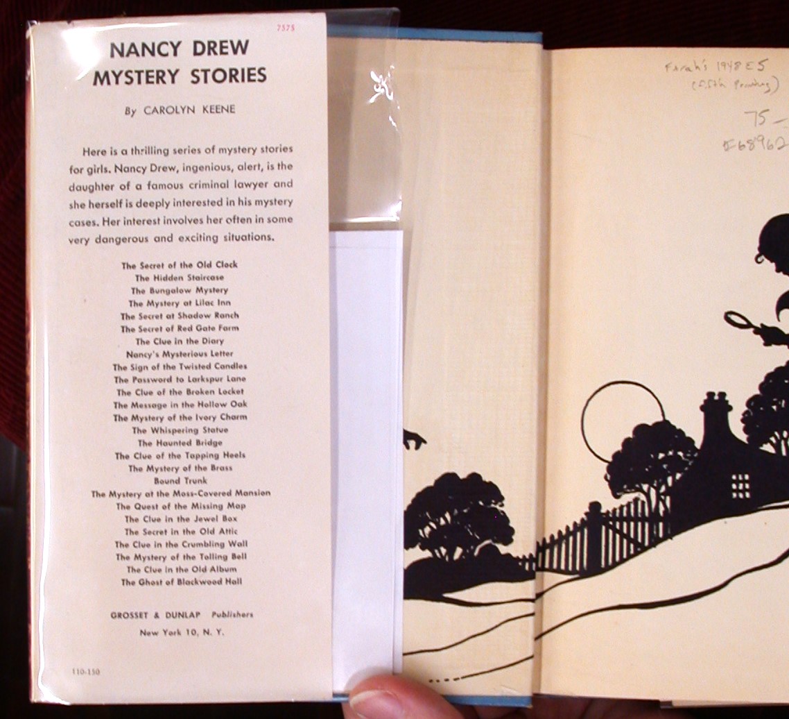 The Ghost of Blackwood Hall jacket front flap and part of front endpapers