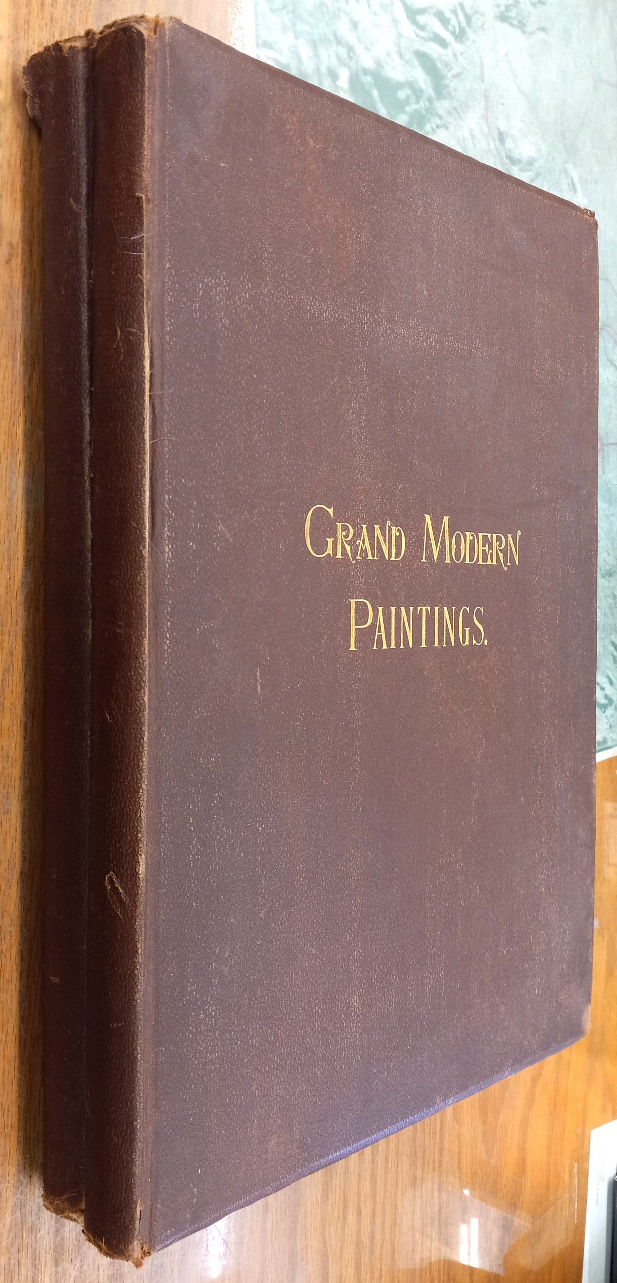 Grand Modern Paintings spines of both volumes and front board of one volume