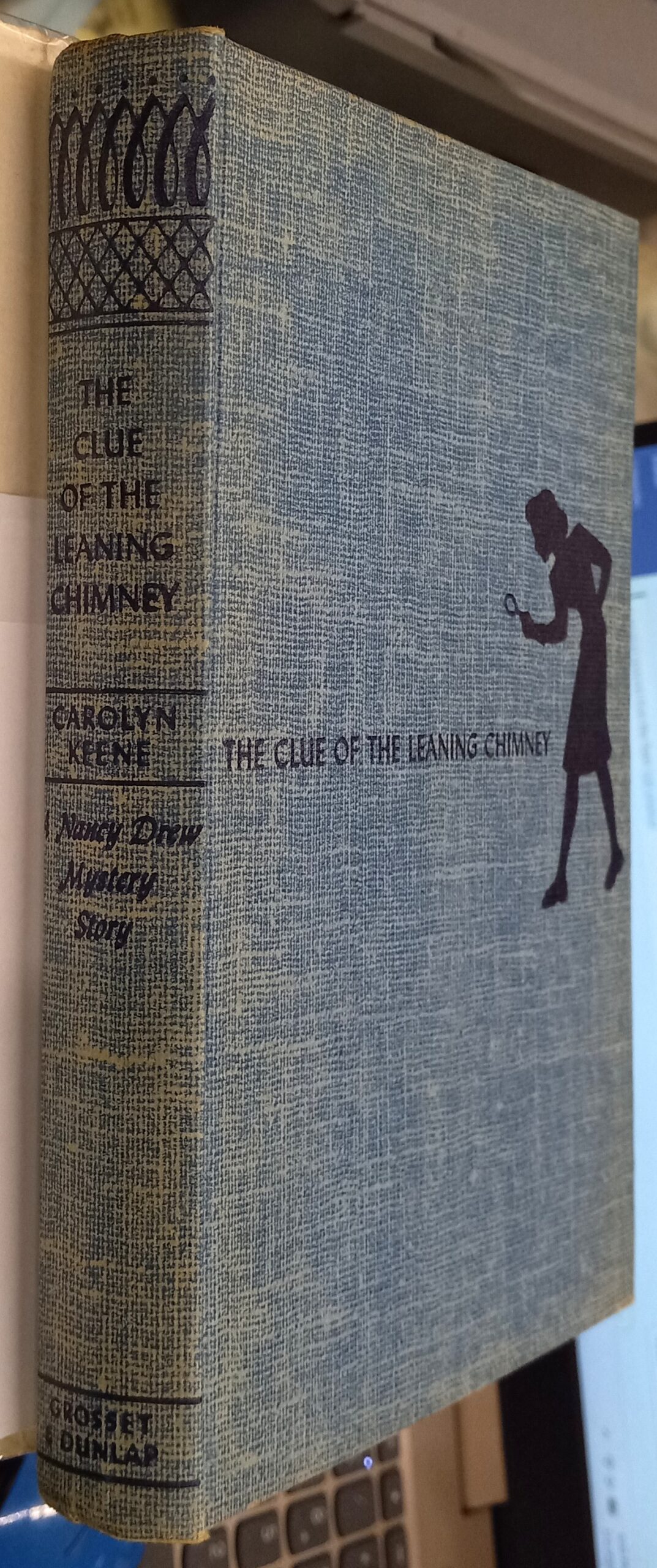The Clue of the Leaning Chimney binding spine and front board
