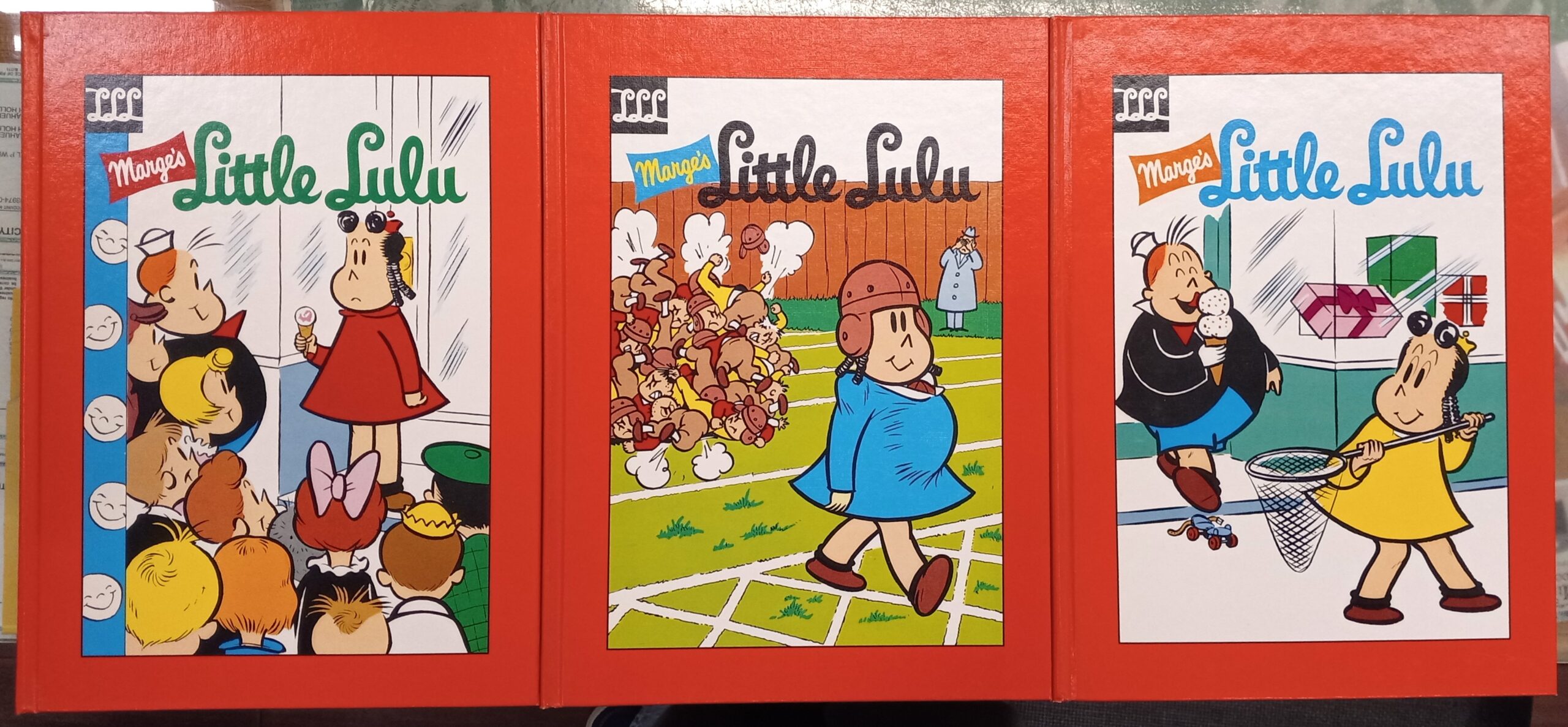Front covers of all three volumes of The Little Lulu Library 1950-1951