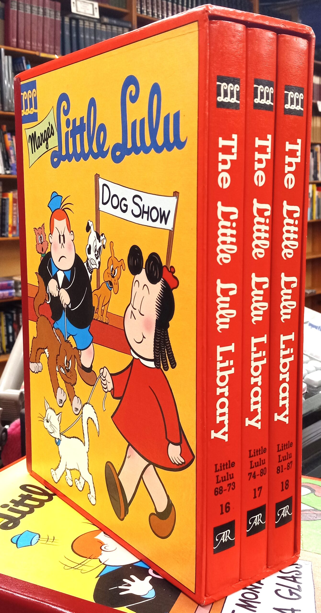 Spines of all three volumes of The Little Lulu Library 1954-1955 inside slipcase