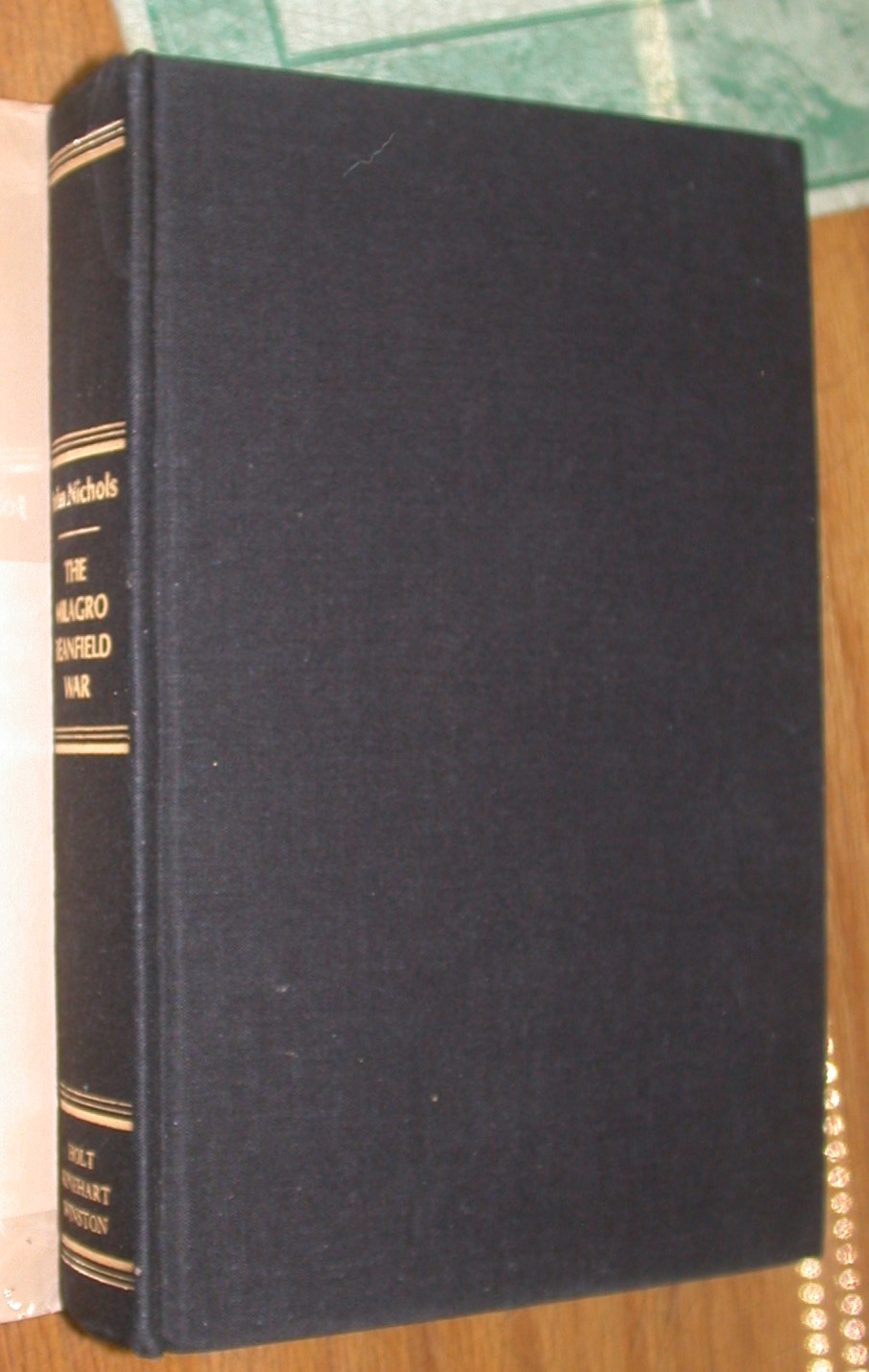 The Milagro Beanfield War binding front board and spine