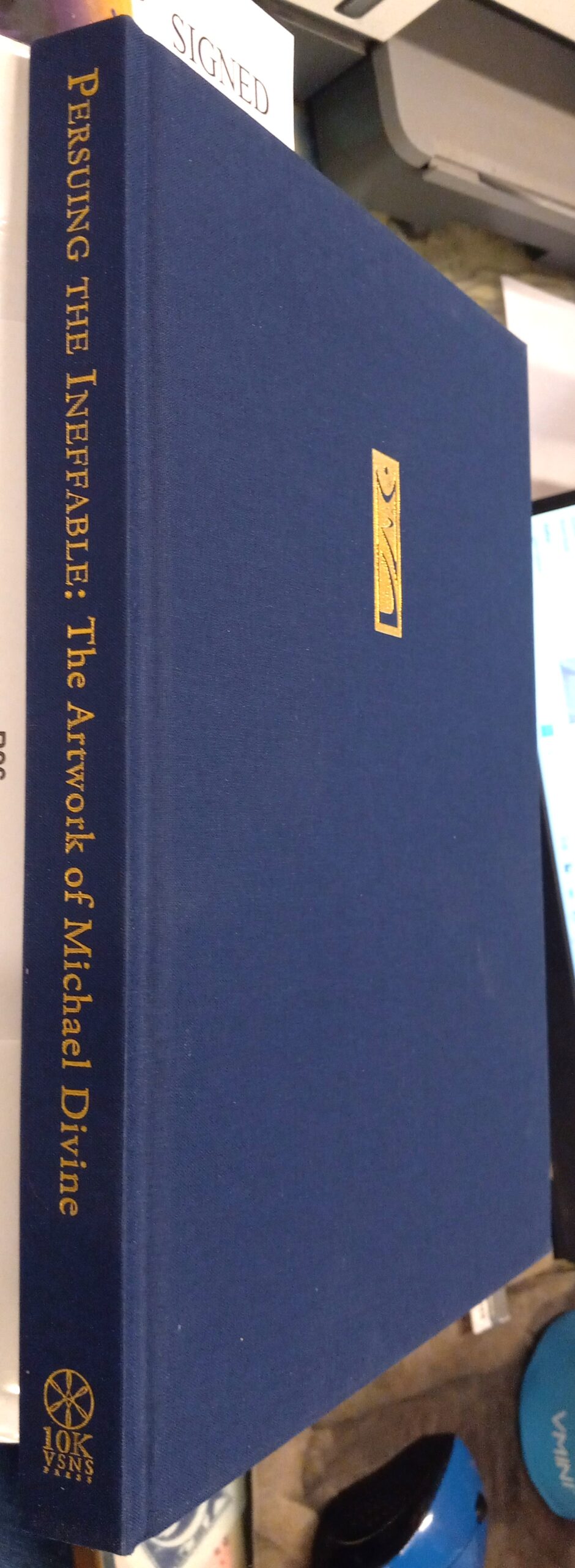 Persuing the Ineffable binding spine and front board