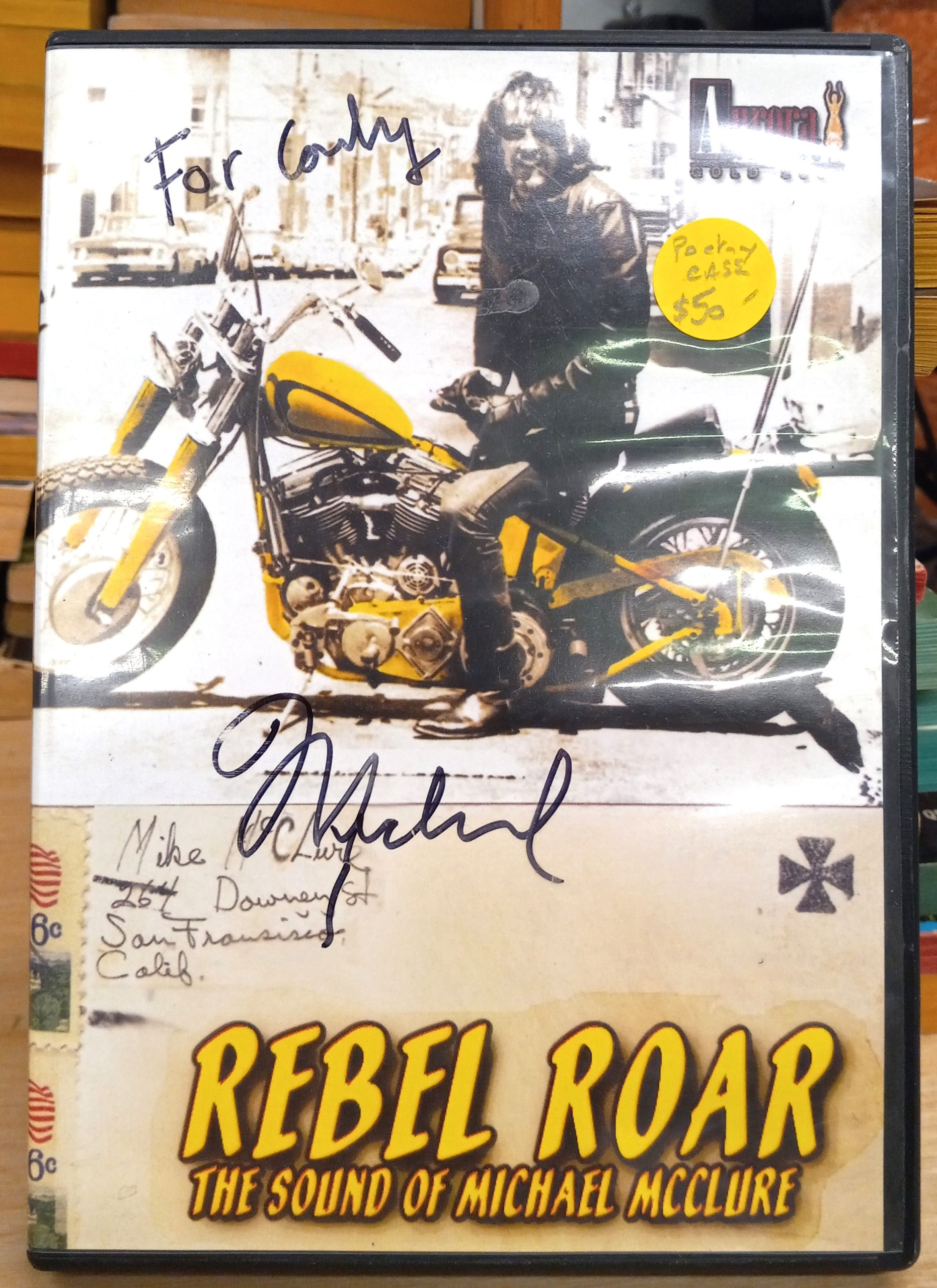 Rebel Roar front cover with author's inscription and signature