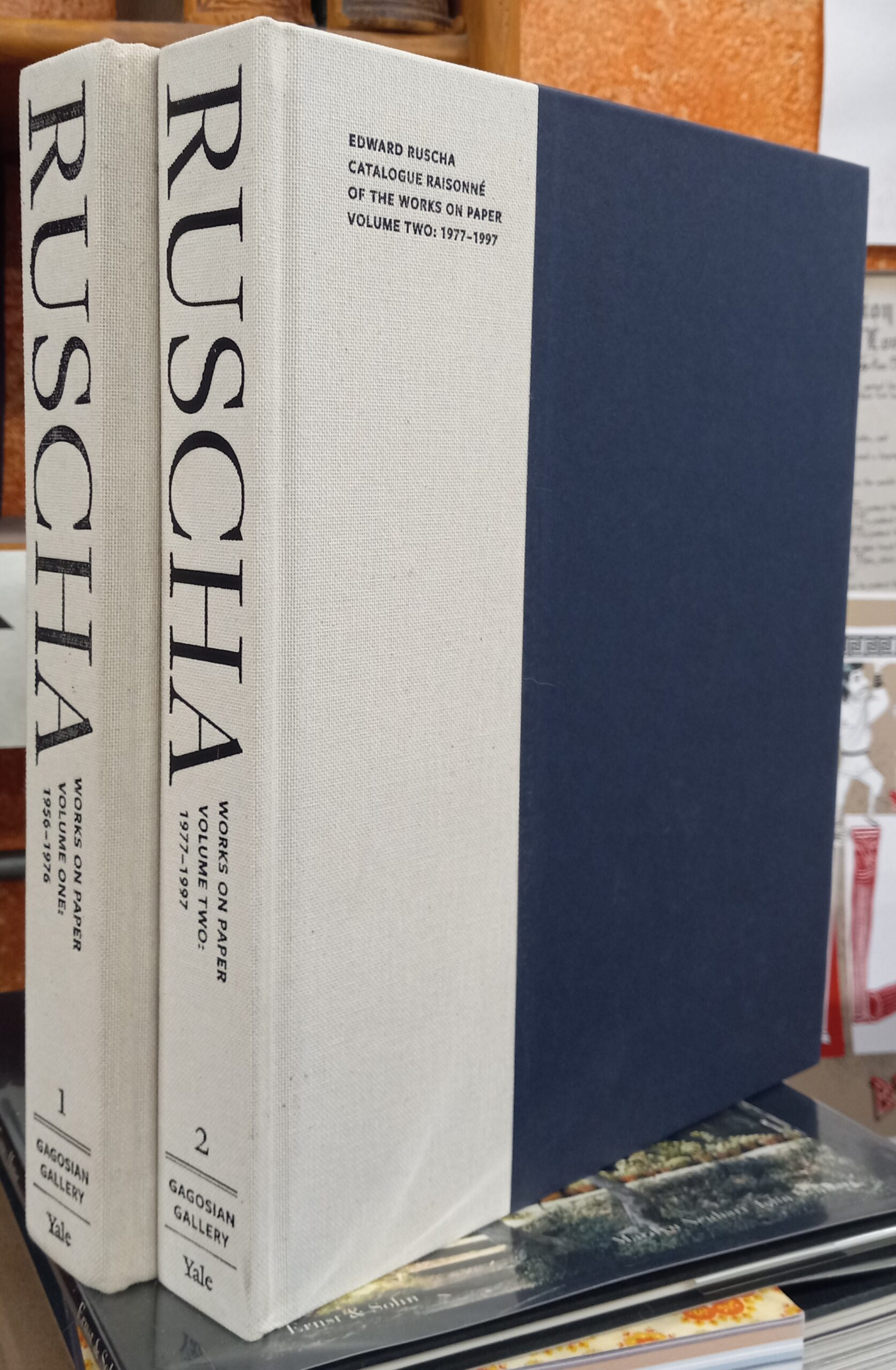 Edward Ruscha Catalogue Raisonne spines of both volumes and front board of Volume 2