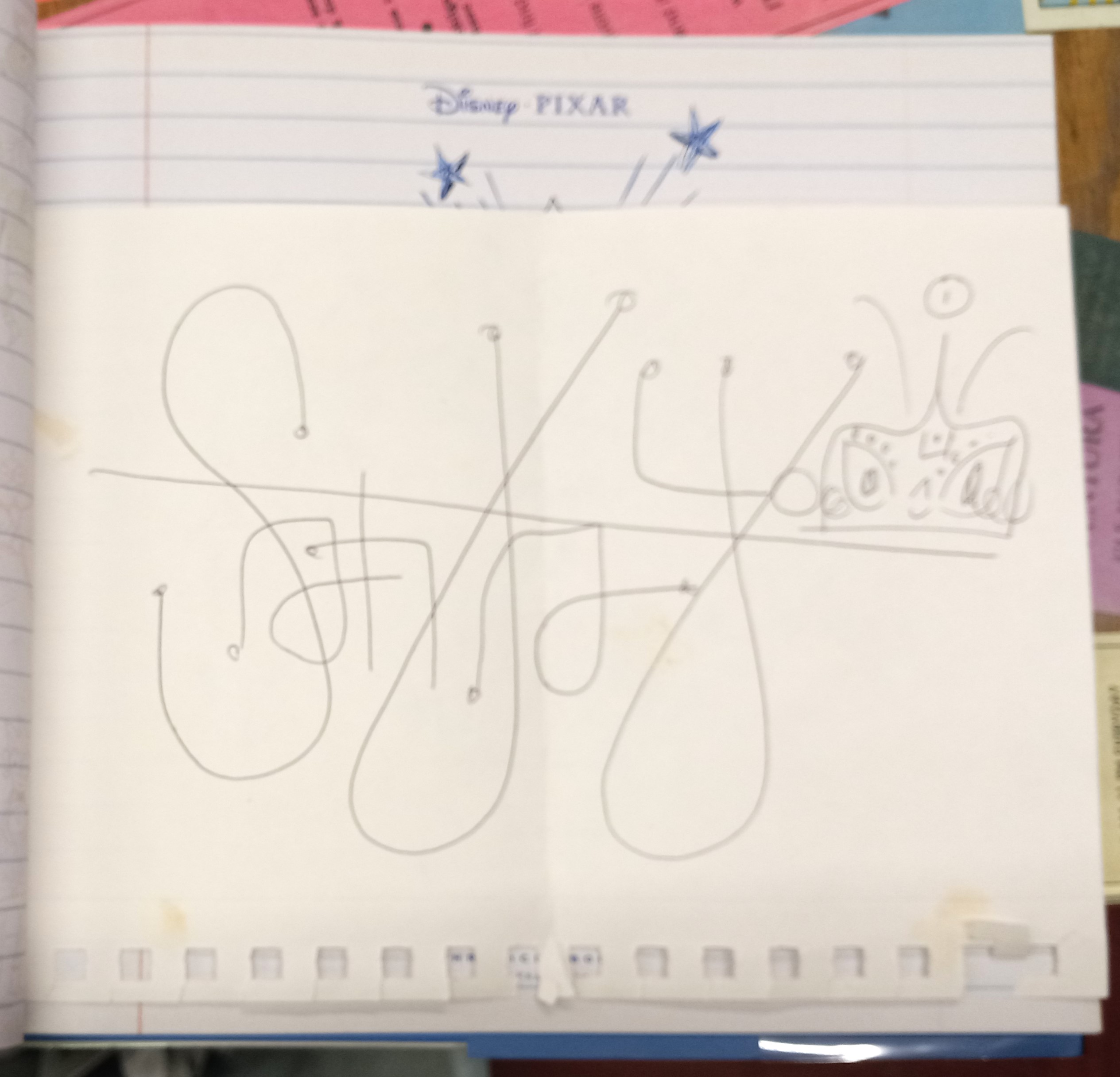 The Art of Sanjay's Super Team autographed page laid into book