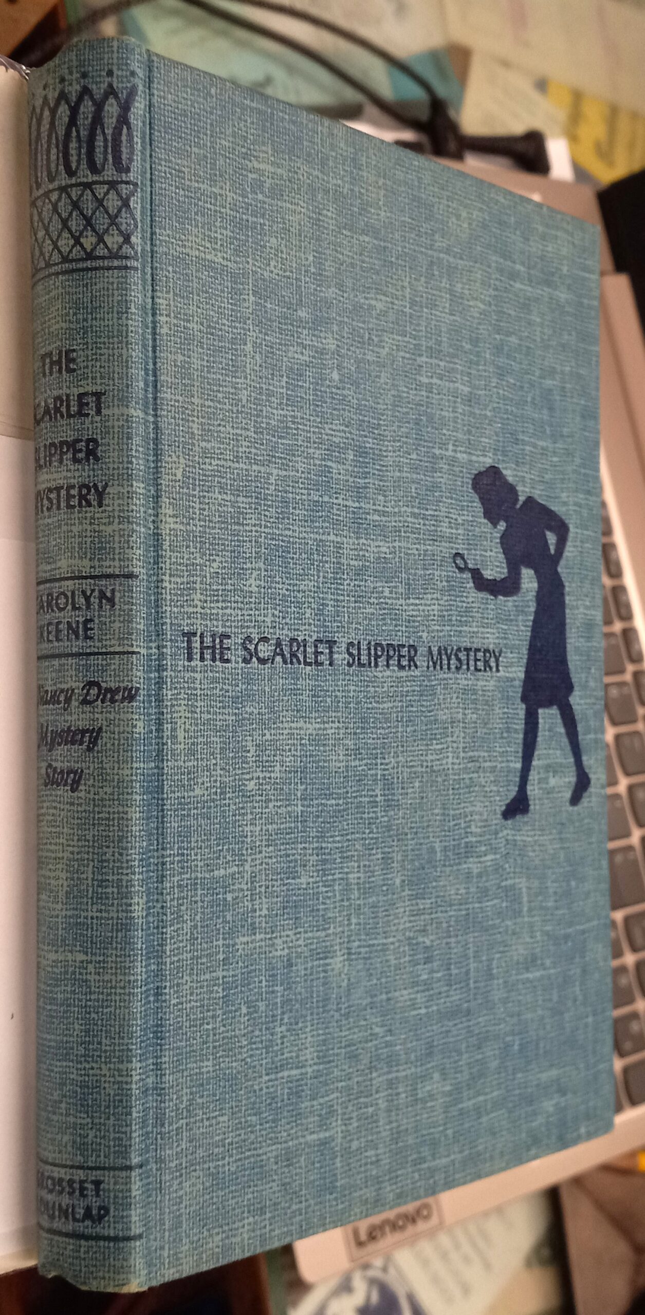 The Scarlet Slipper Mystery binding spine and front board