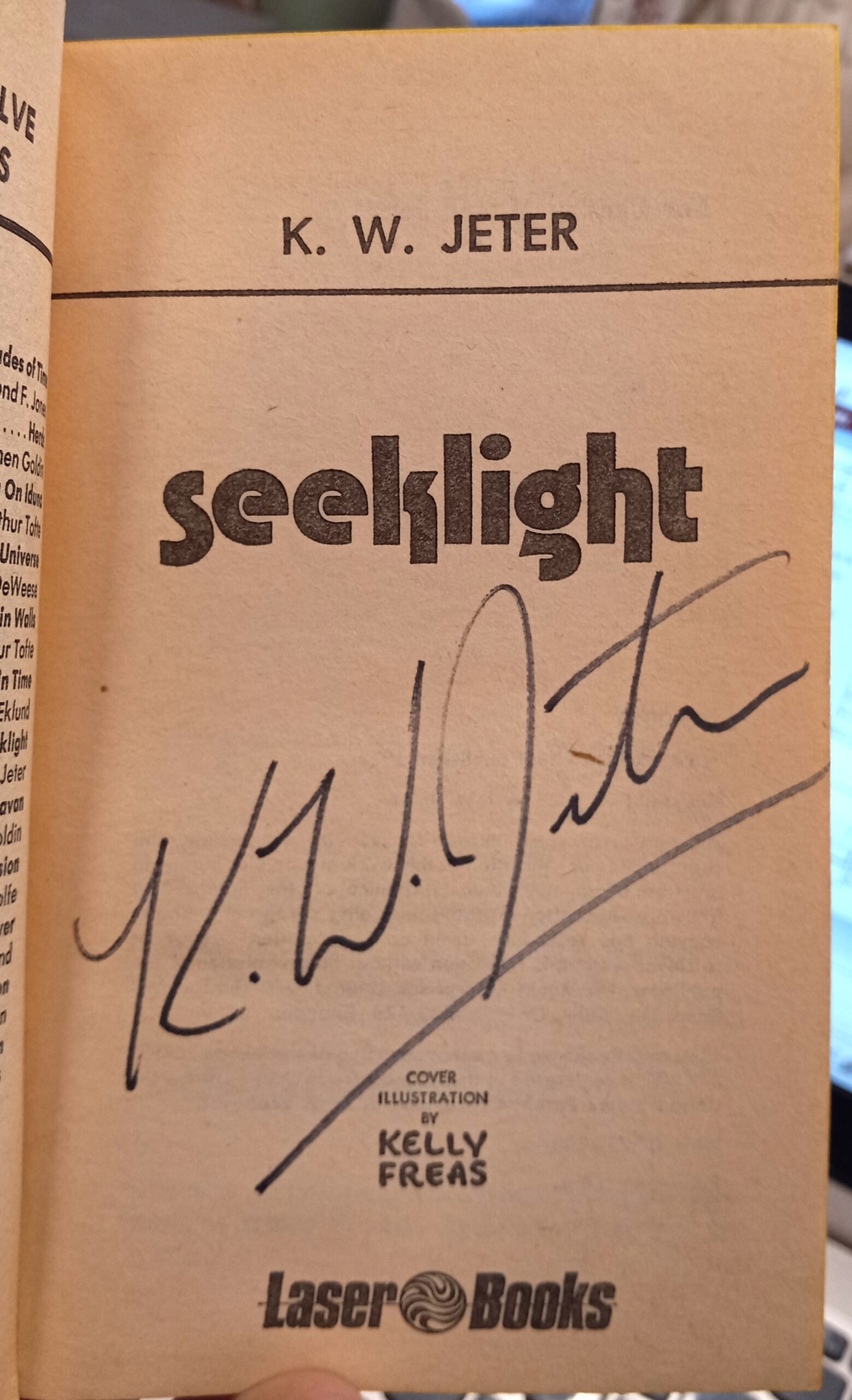 Seeklight title page with author's signature