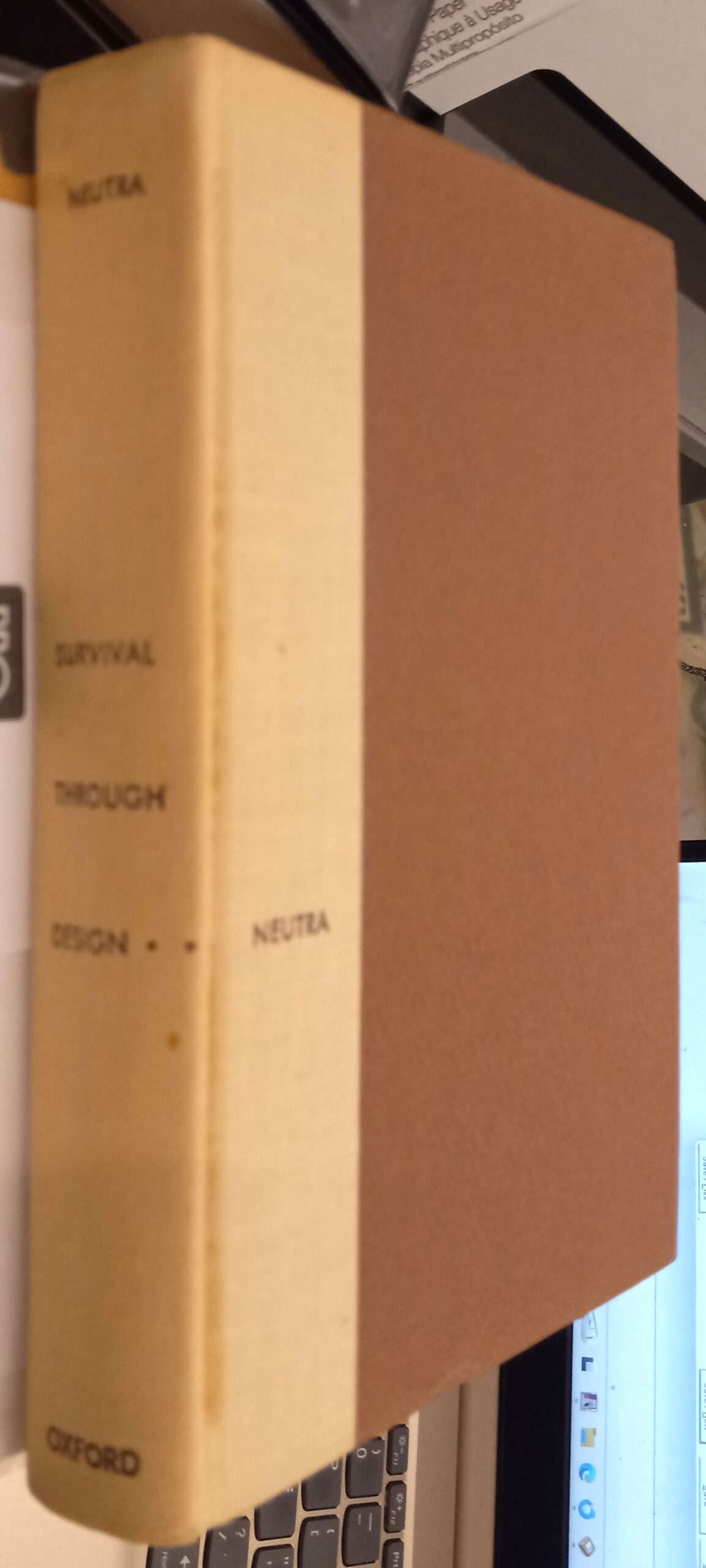 Survival Through Design binding spine and front board