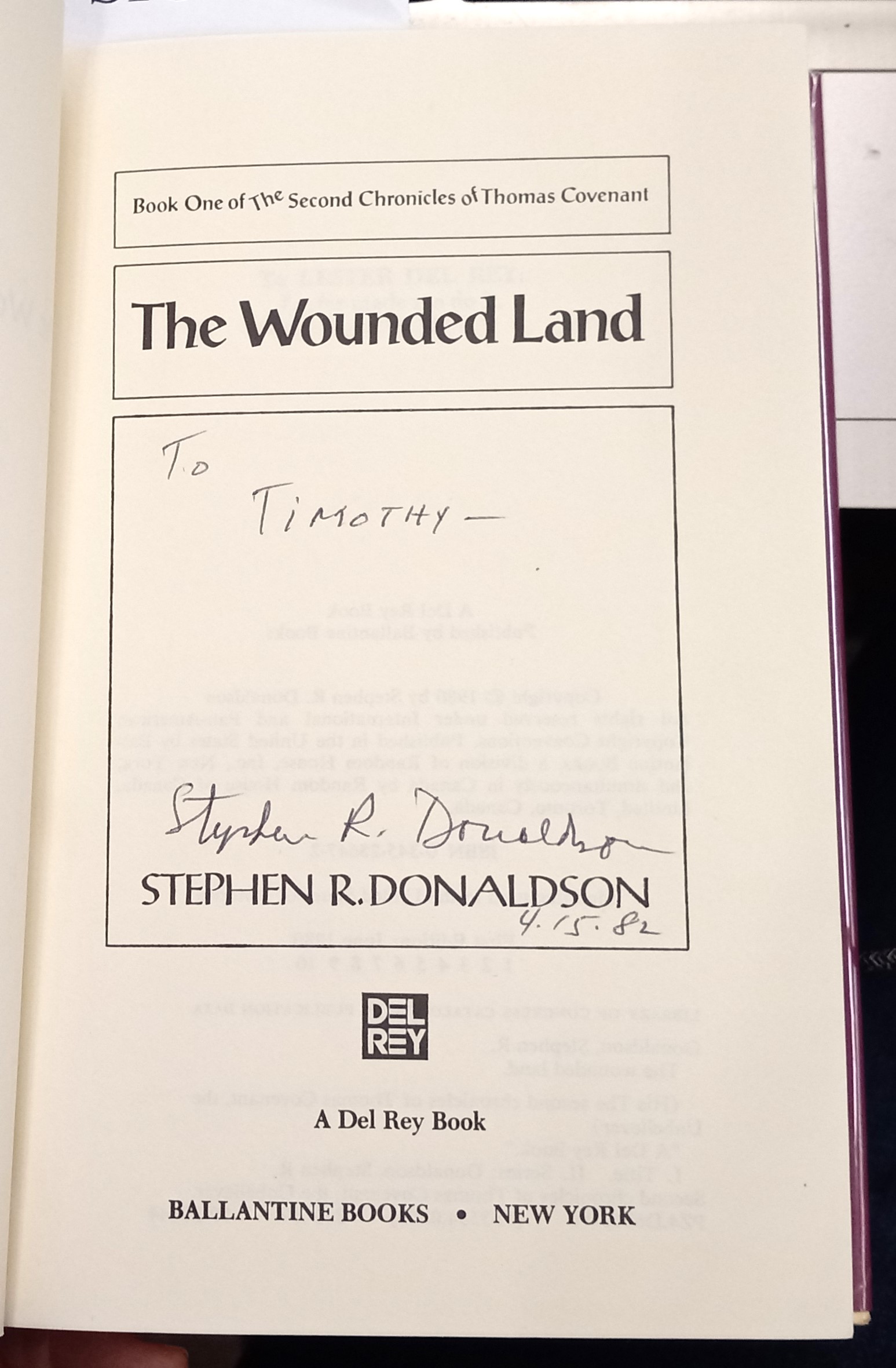 The Wounded Land title page with author's inscription and signature