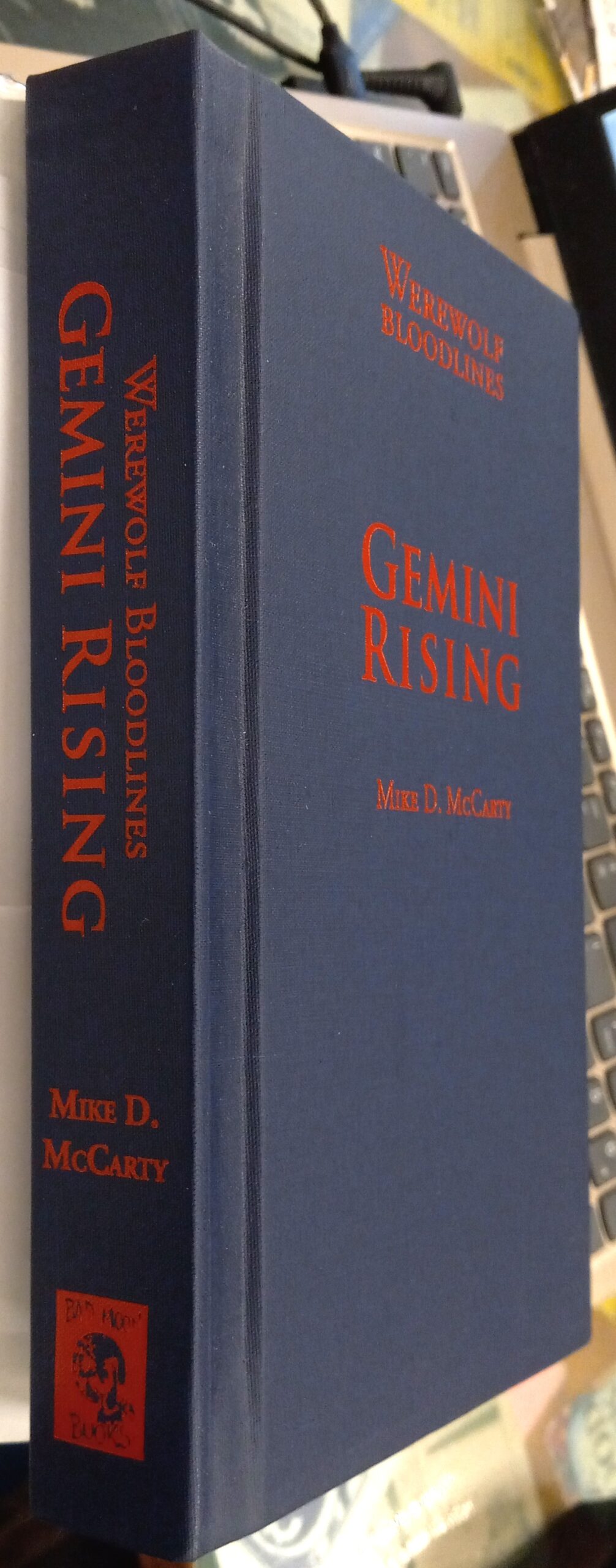 Gemini Rising binding spine and front board