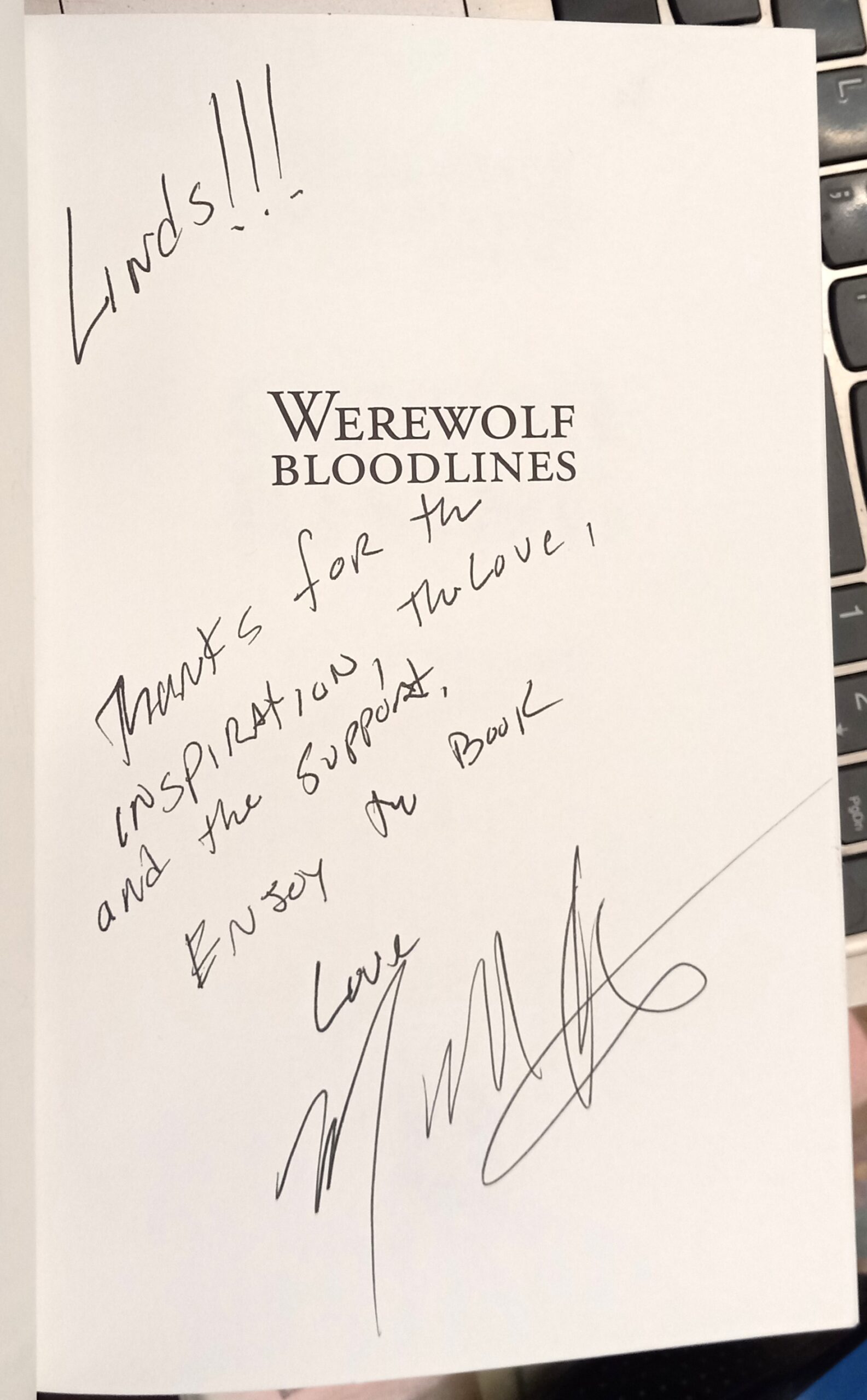 Gemini Rising half-title page with author's inscription and signature