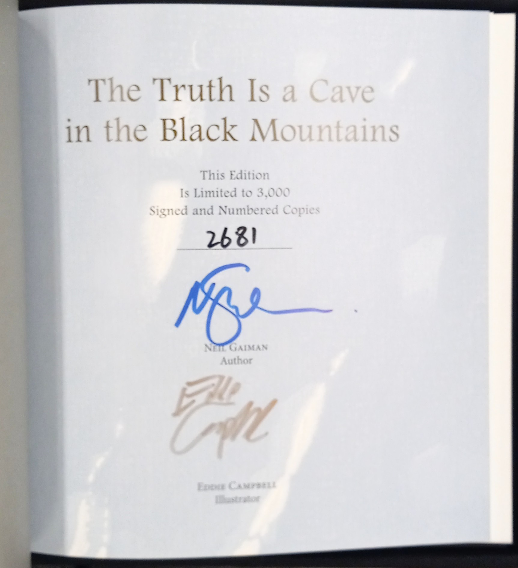 The Truth is a Cave in the Black Mountains limitation page with number and signatures of author and artist